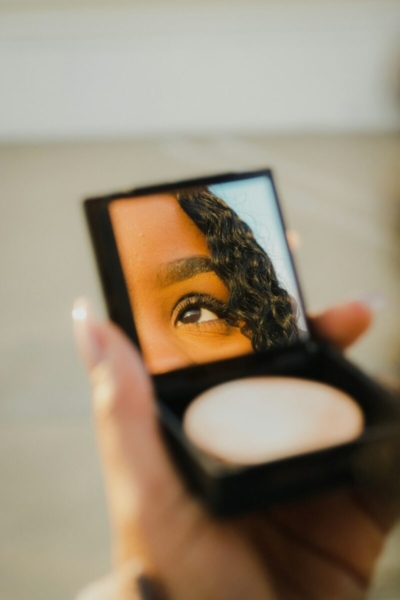 reflection of a girl on a mirror